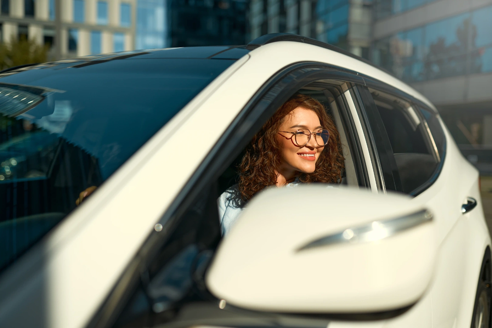 Australian driver in a modern white car